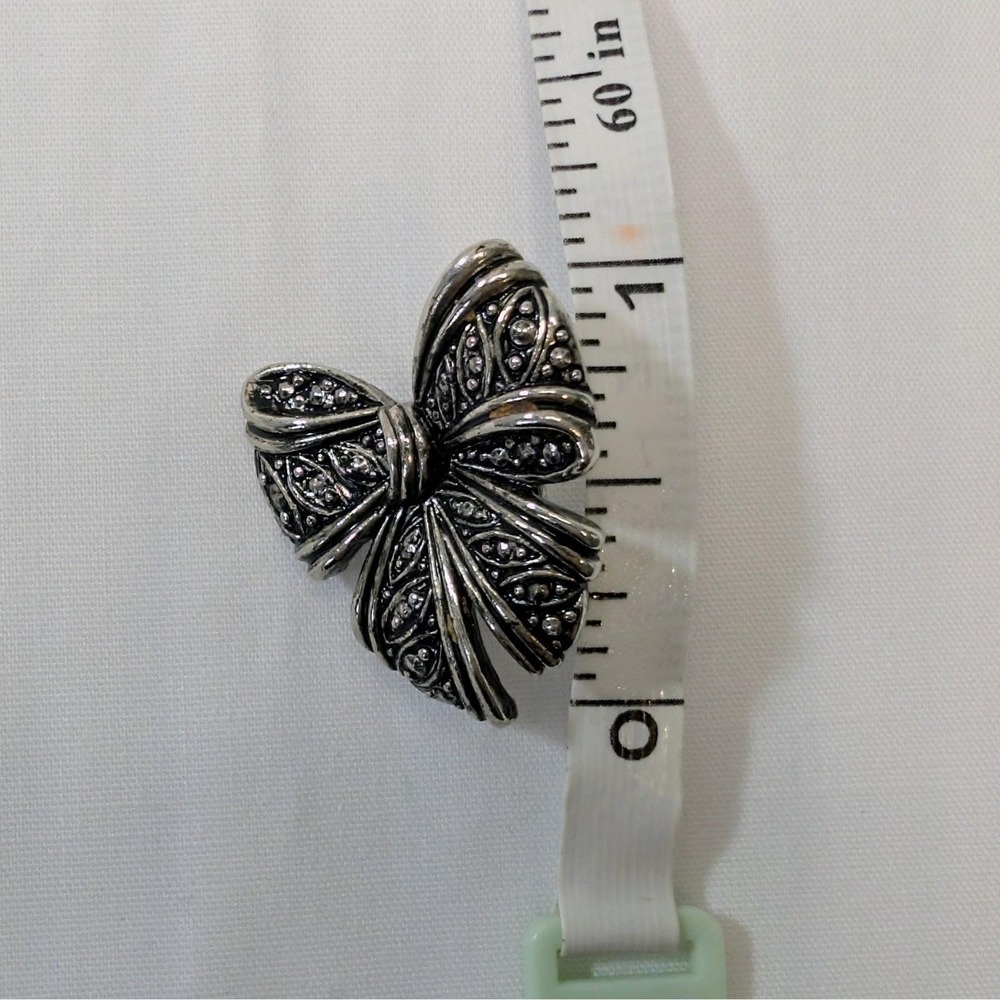 Vintage 1990 AVON Clip On Filigree Antique Silver Bow Earrings 1" - Picture 9 of 9